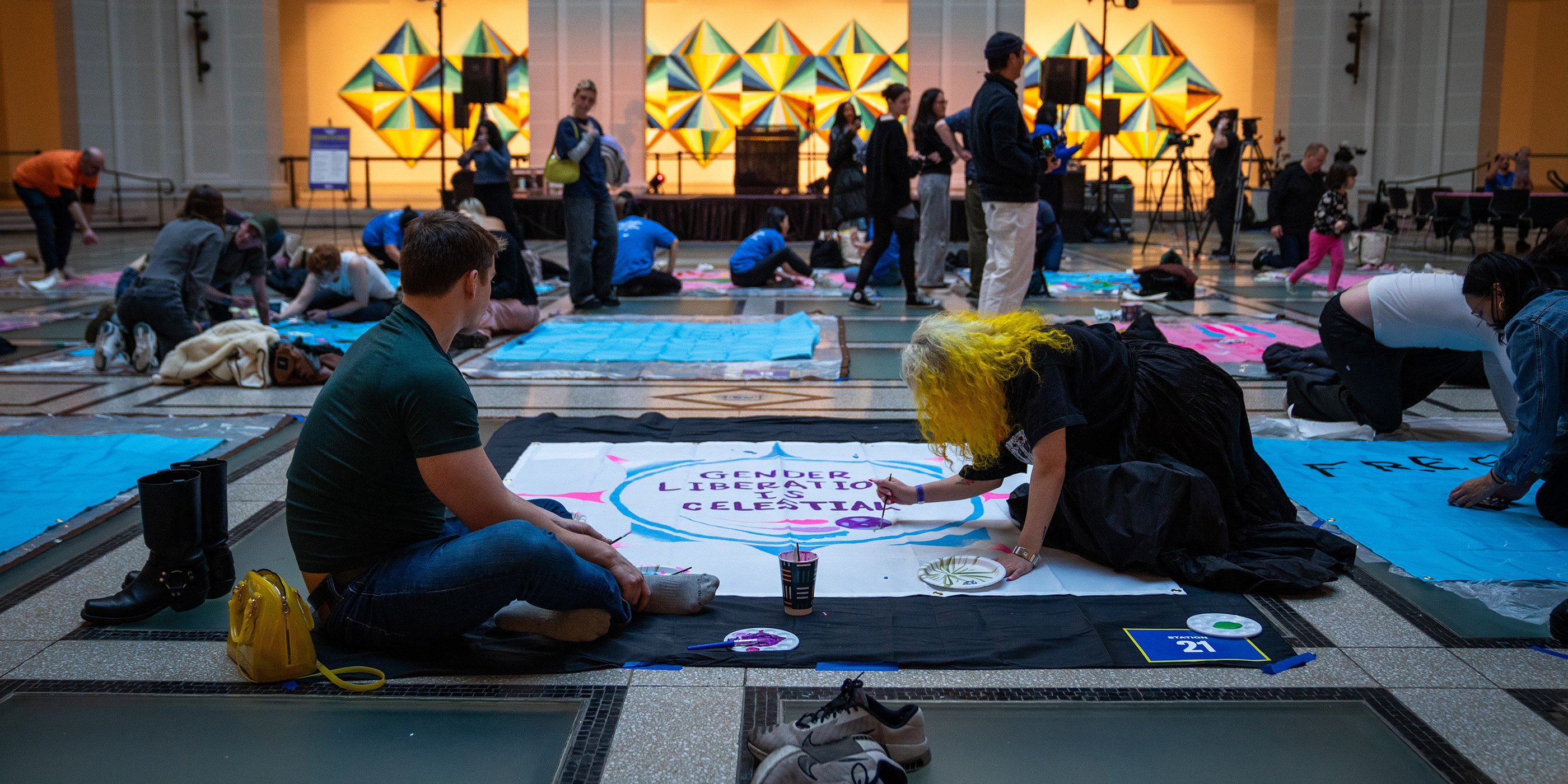 Individuals at the ACLU's quilt making event at the Brooklyn Museum.